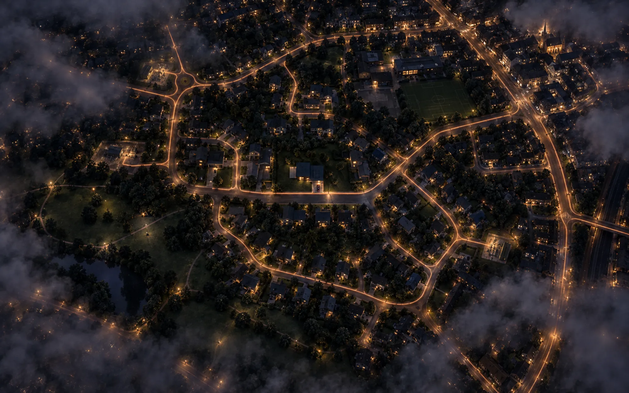 The whole neighbourhood from high above at night, copper lines joining its streets into one grid, cloud drifting below the camera